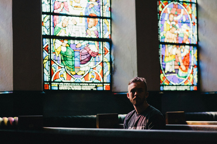 Person sitting in pew