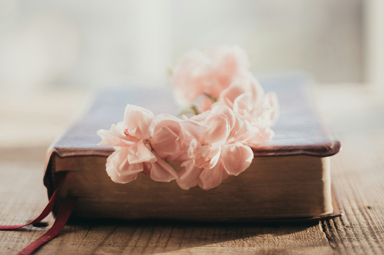 Bible with flowers on it