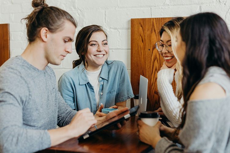 Group of friends laughing together