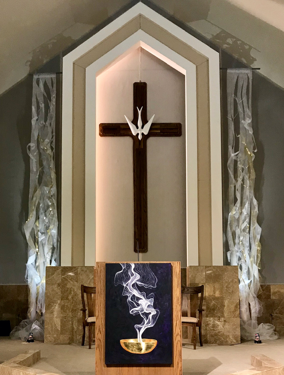 Visual flanking the cross