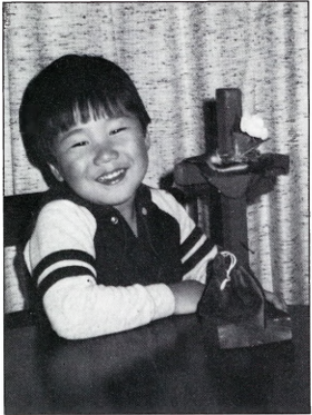 Boy with cross