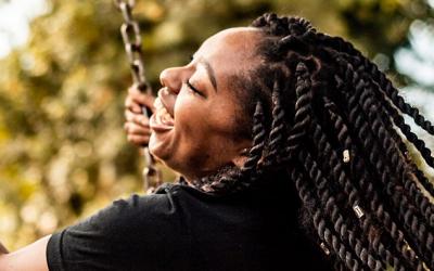 picture of woman on a swing