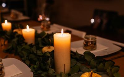Thanksgiving setup with candles and pumpkins