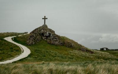 Cross on rocky mound