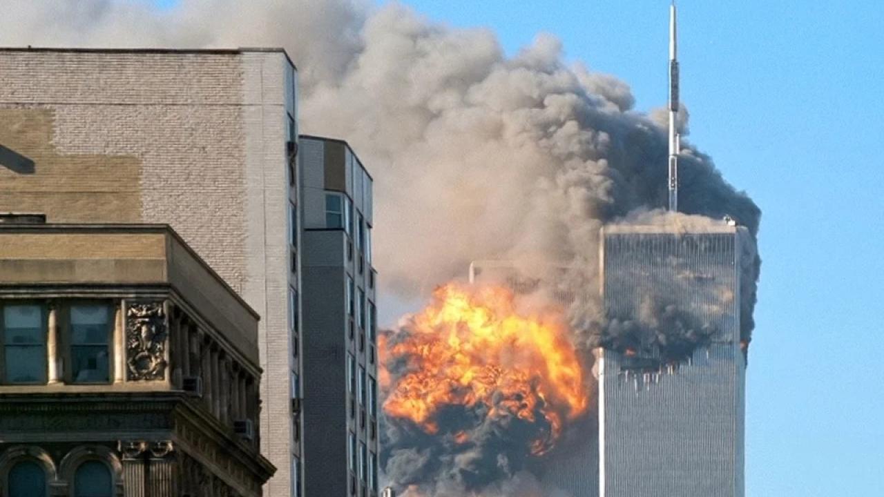 UA Flight 175 hits WTC south tower on 9-11. Robert J. Fisch derivative work: upstateNYer, CC BY-SA 2.0 <https://creativecommons.org/licenses/by-sa/2.0>, via Wikimedia Commons