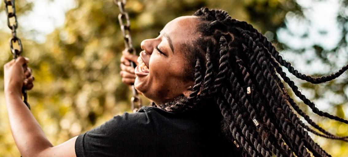 picture of woman on a swing