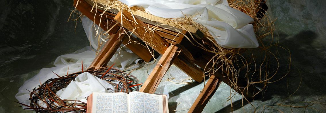 Manger, crown of thorns, and Bible