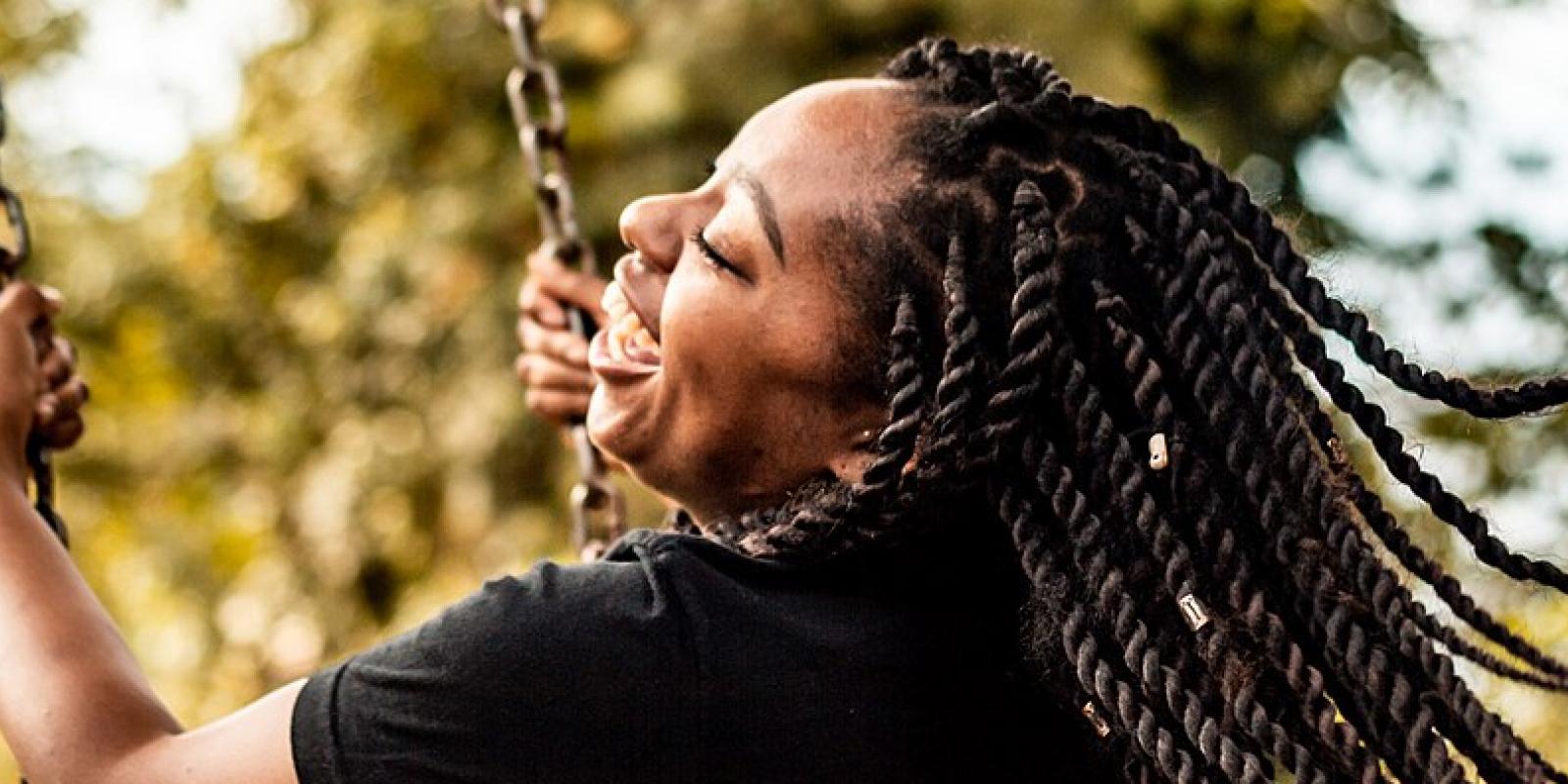 picture of woman on a swing