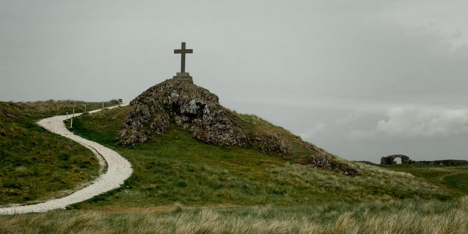 Cross on rocky mound