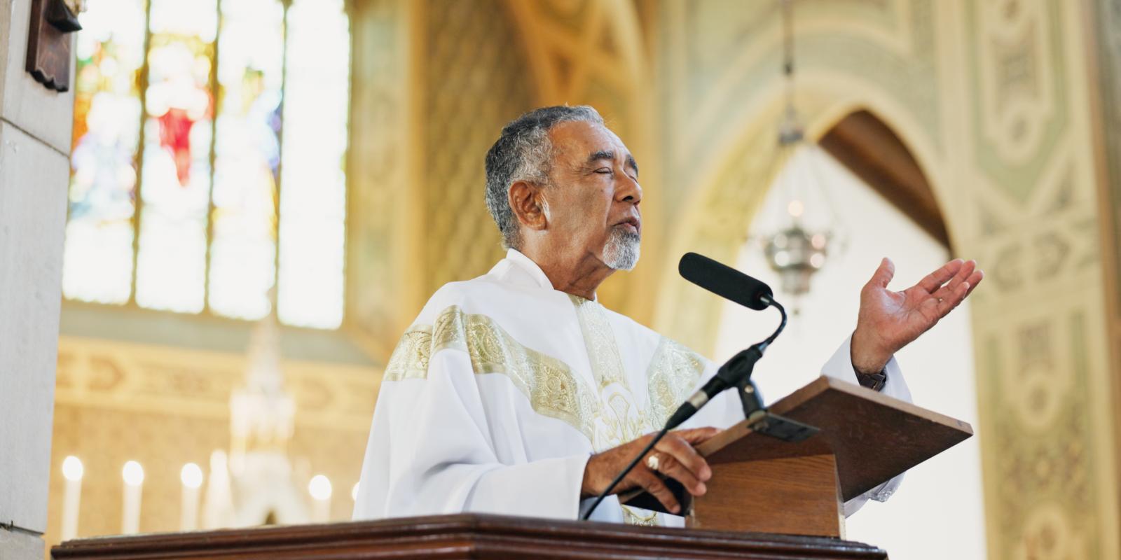 Pastor leading in prayer